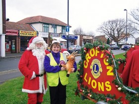 Santa and Lion President Lisa Pitt in 2008 Christmas Collections